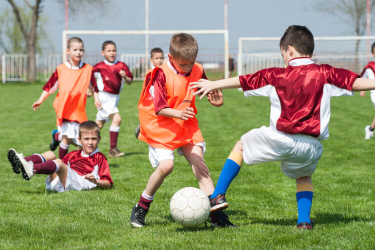 young boys playing soccer