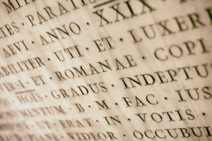 Ancient Latin inscription carved into stone