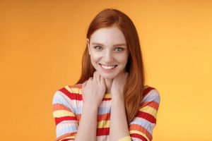 happy young redhead lady